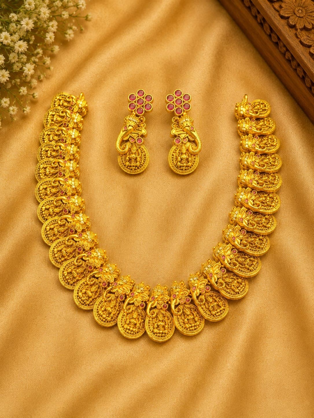 Short gold Lakshmi coin necklace with jhumkas